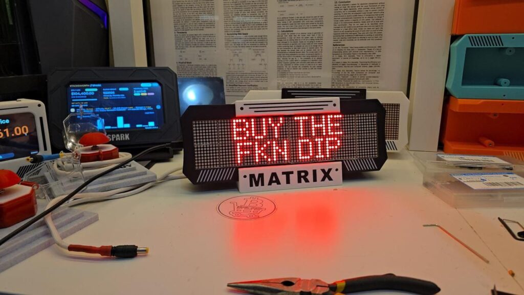You know it’s real when the LED screams BUY THE F*N DIP above MATRIX. Stack sats, ignore the noise 🚀 #crypto #buythedip.
